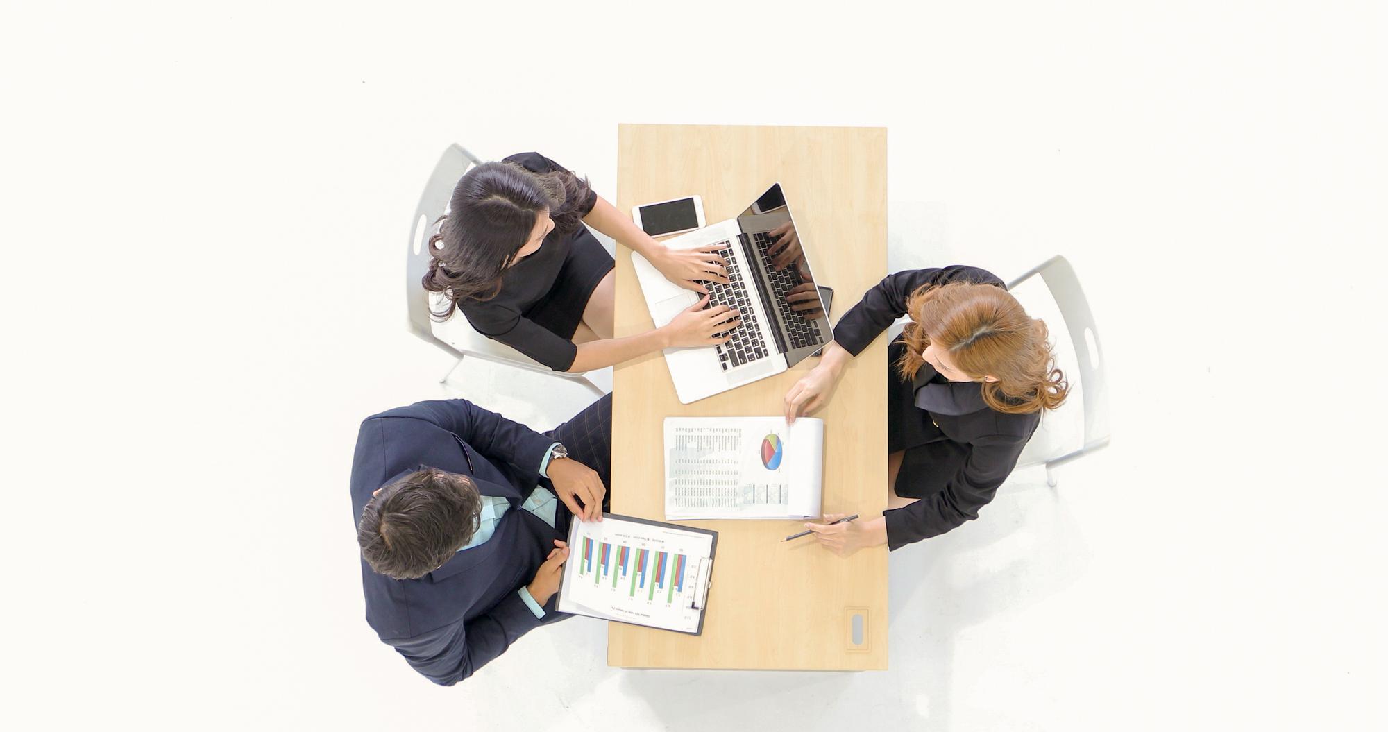Team discussing a financial plan on a table